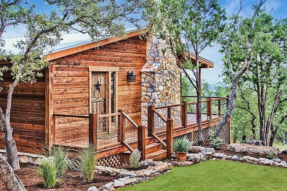 Property management done right with this fantastic log cabin overlooking the scenic Texas Hill Country.